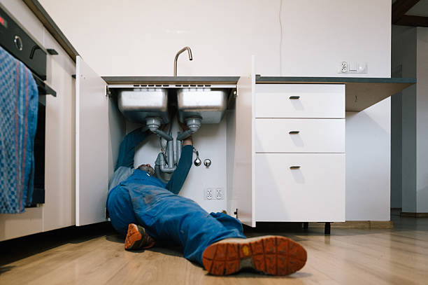 Professional Emergency Plumber technician working in Tumwater, WA